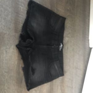Black distressed shorts
